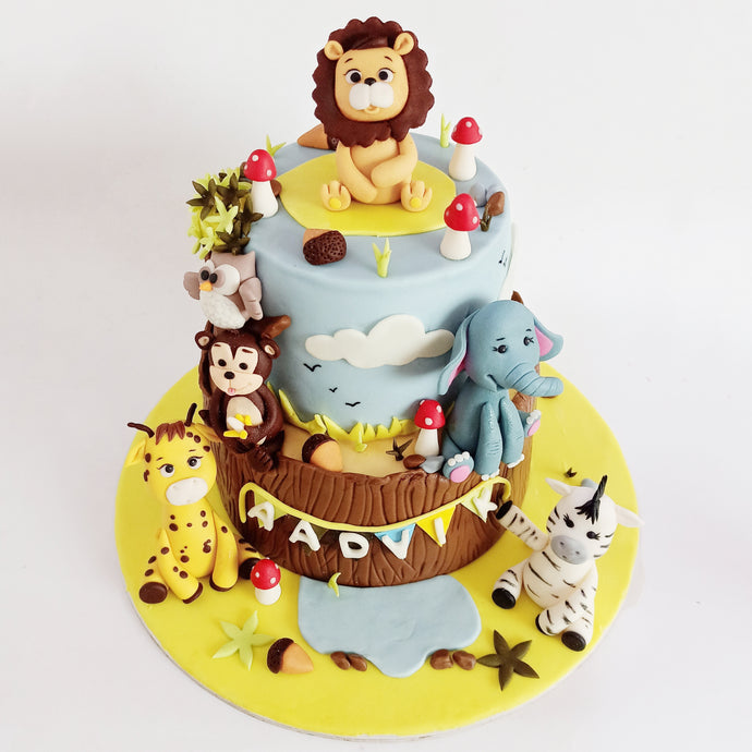 first birthday jungle two tier cake