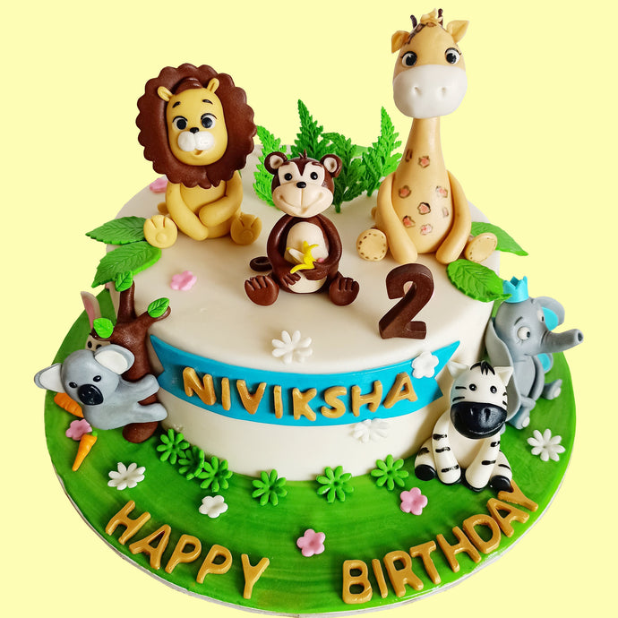 jungle party animals theme cake