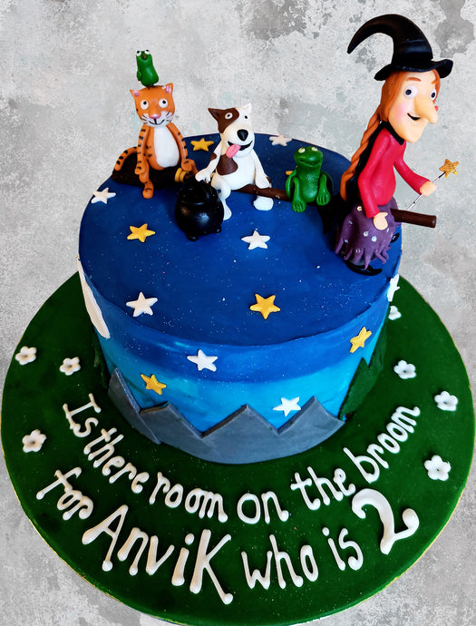 Room on the broom designer cake with a witch on a broom