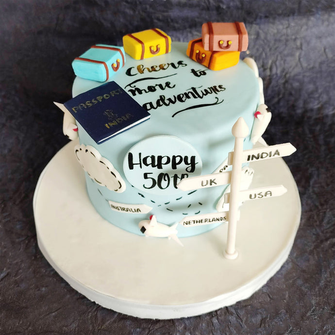 adventure and travel theme cake
