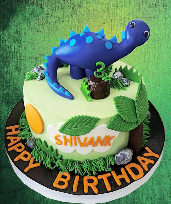 baby dinosaur forest theme cake