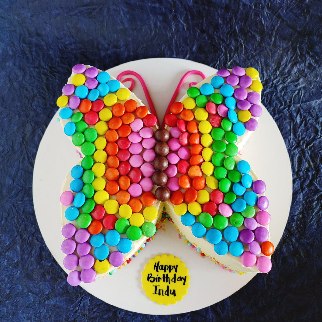 butterfly rainbow and gems cake