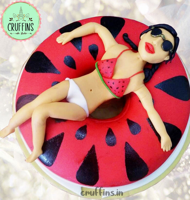 girl chilling in a watermelon tub cake