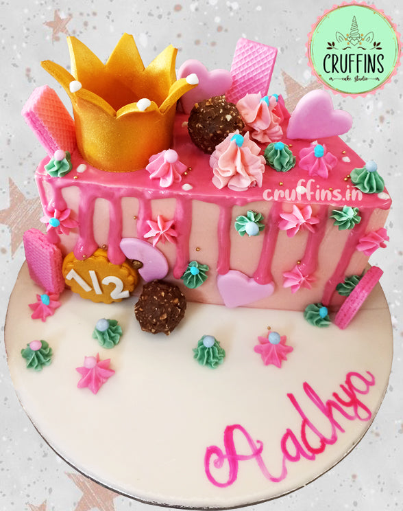 half birthday crown theme cake