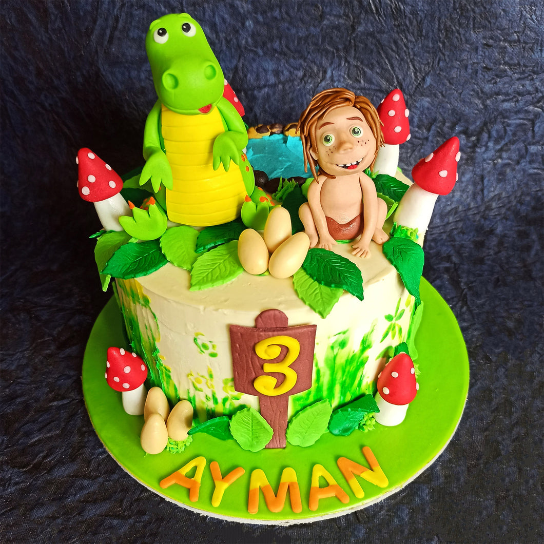 little dinosaur jungle mowgli cake