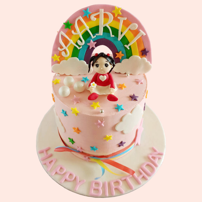 second birthday little girl rainbow cake