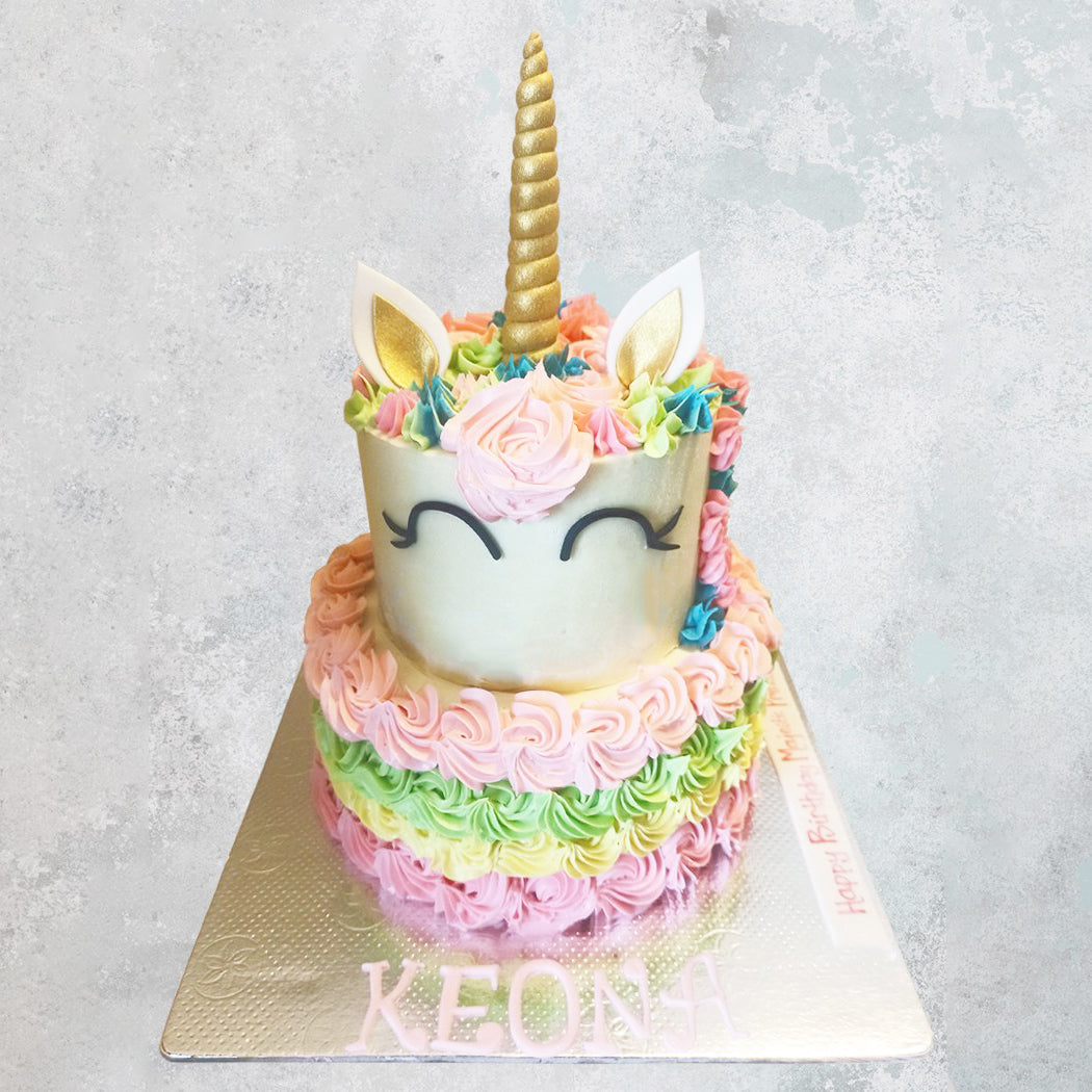 unicorn theme 2 tier cake.