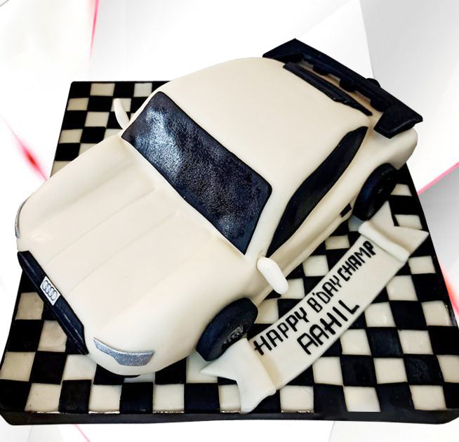 white luxury car cake checkered floor